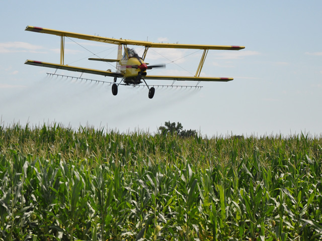 As more herbicide-tolerant crops come to market, applicators need to be attentive to atmospheric changes such as temperature inversions, which can allow spray droplets to drift miles off target. (DTN photo by Nick Scalise)